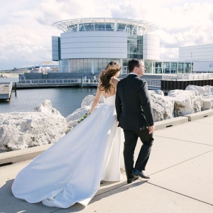 Wedding Couple walking along the Lakefront at Discovery World